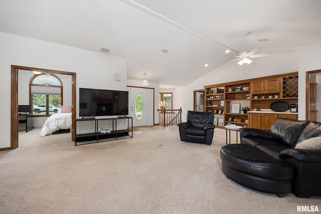 905 Highland Ct, Germantown Hills, IL 61548 - living area with light carpet, a ceiling fan, high vaulted ceiling, and baseboards