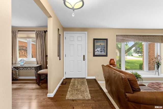 22 Cypress Pt, Pekin, IL 61554 - foyer entrance featuring dark wood-type flooring and baseboards