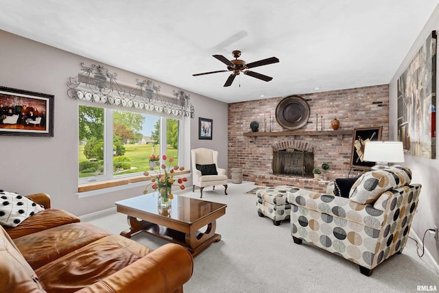 22 Cypress Pt, Pekin, IL 61554 - living area featuring carpet, a ceiling fan, a brick fireplace, and baseboards