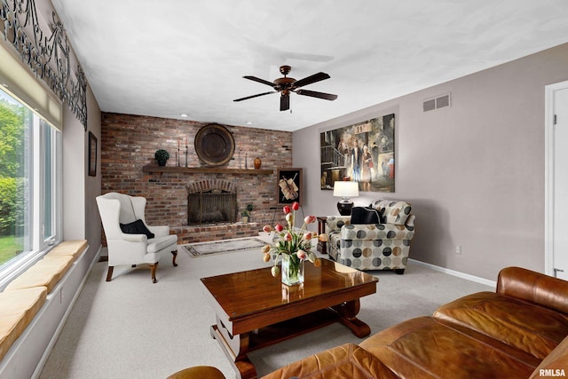 22 Cypress Pt, Pekin, IL 61554 - carpeted living area featuring ceiling fan, a brick fireplace, and baseboards