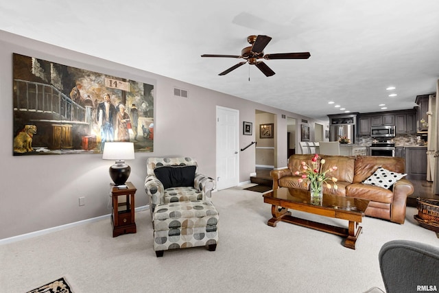 22 Cypress Pt, Pekin, IL 61554 - living area featuring a ceiling fan, light carpet, baseboards, and recessed lighting