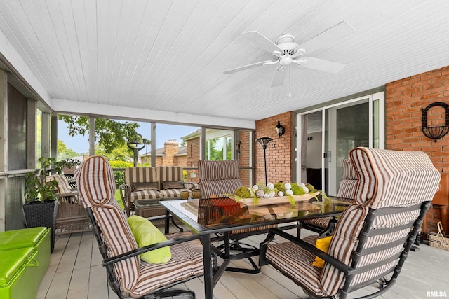 22 Cypress Pt, Pekin, IL 61554 - sunroom featuring a ceiling fan, outdoor dining area, and an outdoor hangout area
