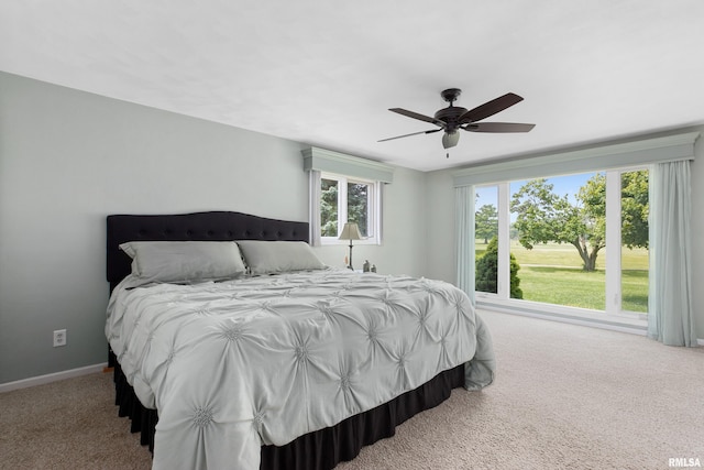 22 Cypress Pt, Pekin, IL 61554 - carpeted bedroom with baseboards and a ceiling fan
