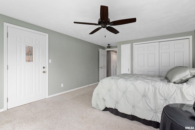 22 Cypress Pt, Pekin, IL 61554 - bedroom featuring light colored carpet, baseboards, a ceiling fan, and a closet