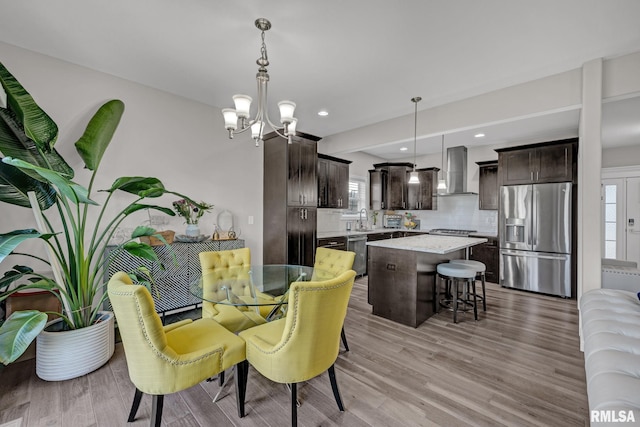 11306 N Joseph St, Dunlap, IL 61525 - dining space featuring a chandelier, wood finished floors, and recessed lighting