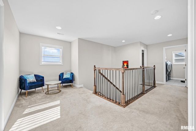 11306 N Joseph St, Dunlap, IL 61525 - sitting room with an upstairs landing, carpet flooring, baseboards, and recessed lighting