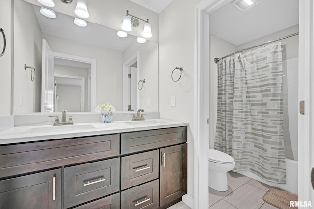 11306 N Joseph St, Dunlap, IL 61525 - full bathroom with double vanity, toilet, tile patterned flooring, and shower / bath combo with shower curtain