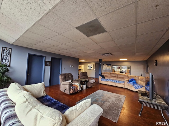 113 N Kickapoo St, Lincoln, IL 62656 - living area with wood finished floors and a drop ceiling