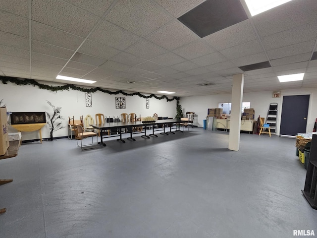 113 N Kickapoo St, Lincoln, IL 62656 - misc room with a paneled ceiling and concrete floors
