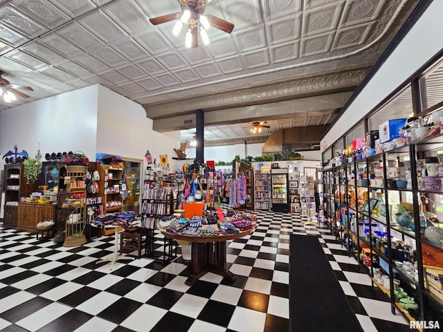 113 N Kickapoo St, Lincoln, IL 62656 - misc room featuring a ceiling fan, tile patterned floors, and an ornate ceiling