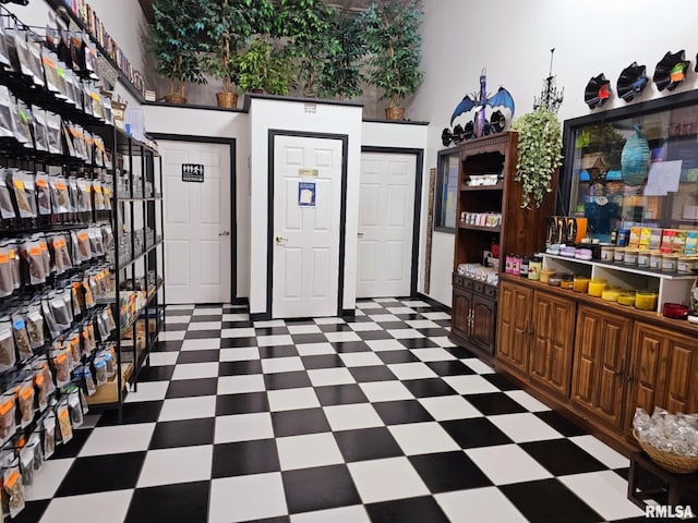 113 N Kickapoo St, Lincoln, IL 62656 - interior space featuring tile patterned floors and a towering ceiling