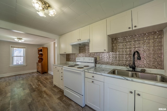 116 S 8th Ave, Canton, IL 61520 - kitchen featuring white range with electric cooktop, a sink, under cabinet range hood, light countertops, and dark wood-style flooring