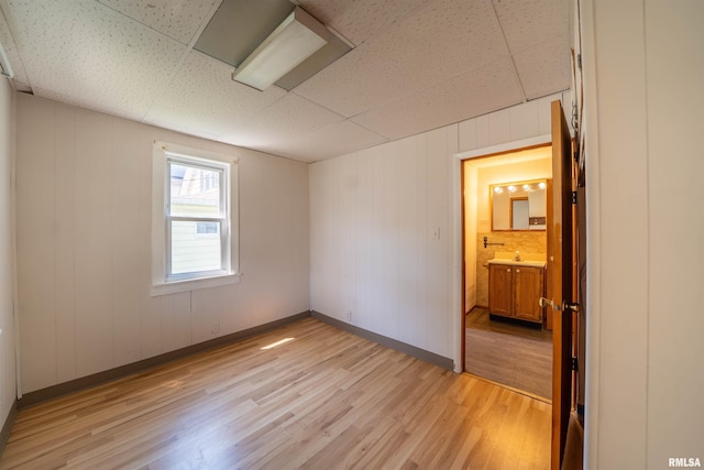 116 S 8th Ave, Canton, IL 61520 - unfurnished room featuring light wood-style flooring and baseboards
