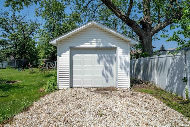 116 S 8th Ave, Canton, IL 61520 - detached garage featuring driveway