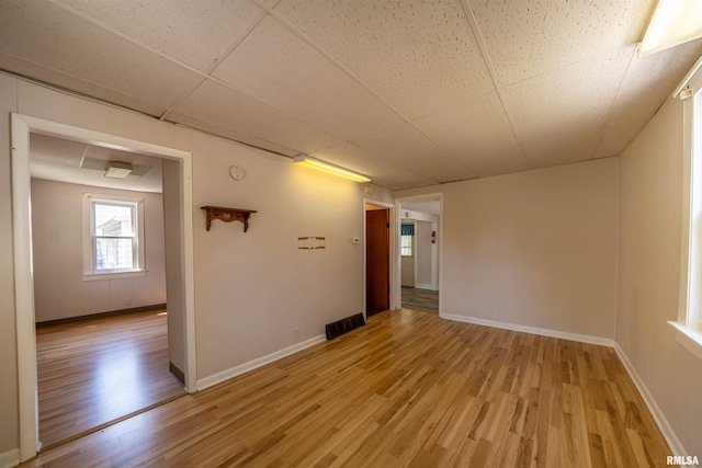 116 S 8th Ave, Canton, IL 61520 - empty room featuring light wood-style floors and baseboards