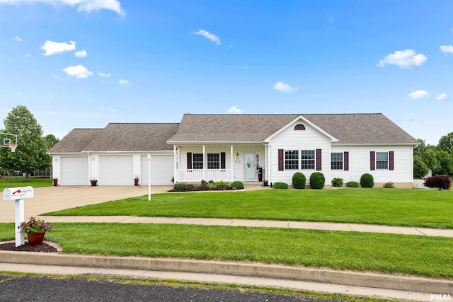 512 N Fairgrounds Way, Elmwood, IL 61529 - view of front of house featuring a front lawn, covered porch, driveway, and an attached garage