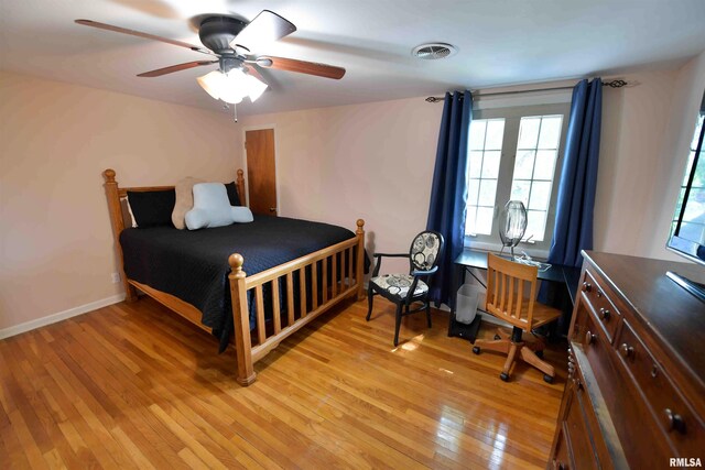 3307 N Biltmore Ave, Peoria, IL 61604 - bedroom featuring light wood-type flooring and ceiling fan