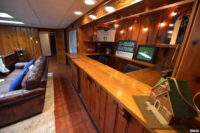 3307 N Biltmore Ave, Peoria, IL 61604 - indoor wet bar featuring wood walls and a paneled ceiling