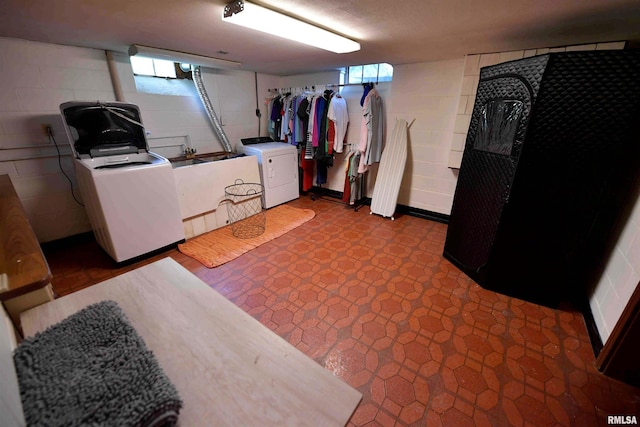 3307 N Biltmore Ave, Peoria, IL 61604 - washroom featuring healthy amount of natural light, washer and dryer, and tile patterned floors