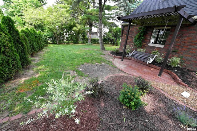 3307 N Biltmore Ave, Peoria, IL 61604 - view of green lawn with a pergola