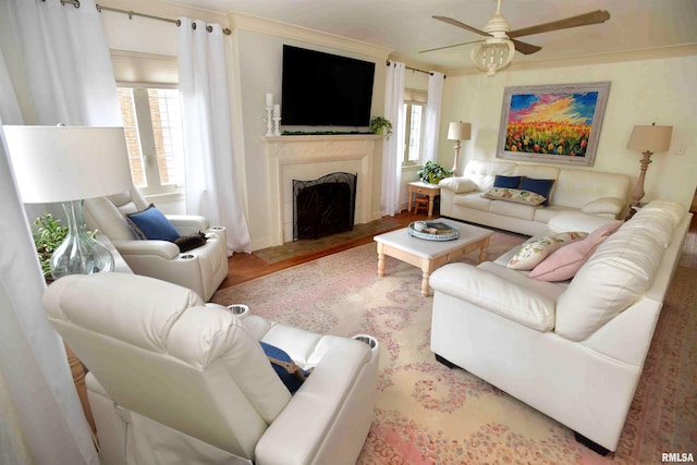 3307 N Biltmore Ave, Peoria, IL 61604 - living area with ceiling fan, a fireplace with flush hearth, and wood finished floors