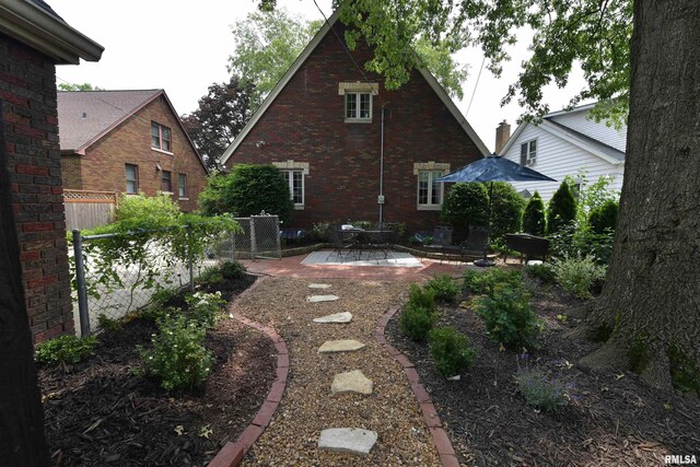 3307 N Biltmore Ave, Peoria, IL 61604 - back of property featuring a patio area and brick siding