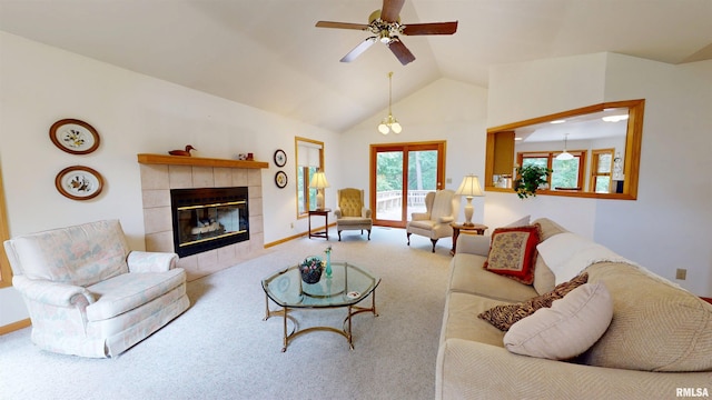 1111 Windy Hill Ct, Varna, IL 61375 - living area with carpet, a tiled fireplace, lofted ceiling, and a ceiling fan