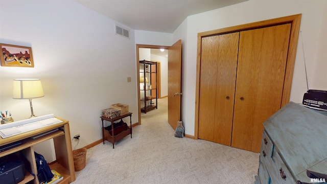 1111 Windy Hill Ct, Varna, IL 61375 - bedroom with light colored carpet, a closet, and baseboards