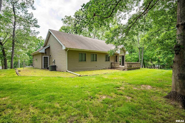 1111 Windy Hill Ct, Varna, IL 61375 - view of side of property featuring a wooden deck, central AC unit, a yard, and a shingled roof