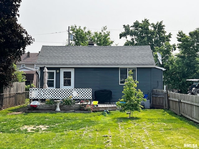 1520 N Finney St, Chillicothe, IL 61523 - rear view of house with a wooden deck and a shingled roof