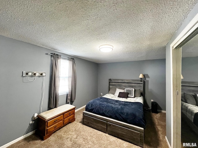 1520 N Finney St, Chillicothe, IL 61523 - carpeted bedroom featuring baseboards and a textured ceiling