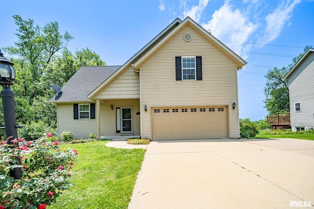 4627 S Queen Aleta Ct, Mapleton, IL 61547 - traditional-style house featuring an attached garage, concrete driveway, a front lawn, and roof with shingles