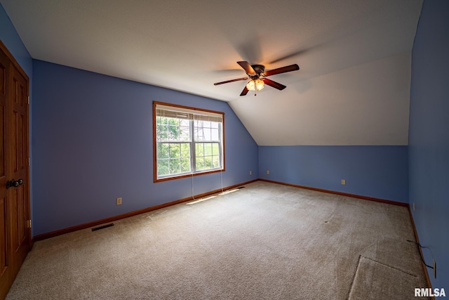 4627 S Queen Aleta Ct, Mapleton, IL 61547 - additional living space featuring carpet floors, a ceiling fan, baseboards, and vaulted ceiling