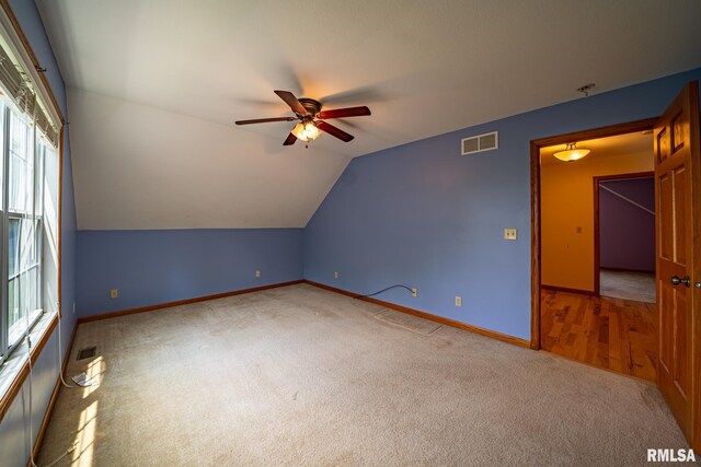 4627 S Queen Aleta Ct, Mapleton, IL 61547 - additional living space with ceiling fan, carpet flooring, and vaulted ceiling