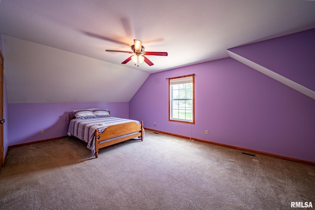 4627 S Queen Aleta Ct, Mapleton, IL 61547 - carpeted bedroom featuring vaulted ceiling, baseboards, and a ceiling fan