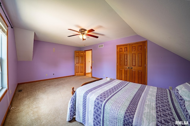 4627 S Queen Aleta Ct, Mapleton, IL 61547 - carpeted bedroom with a closet, vaulted ceiling, and ceiling fan