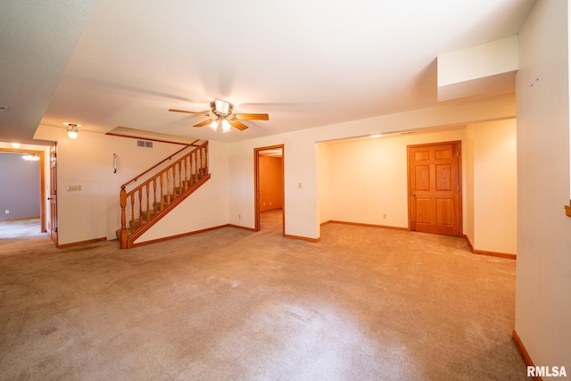 4627 S Queen Aleta Ct, Mapleton, IL 61547 - unfurnished living room featuring carpet floors, stairway, baseboards, and ceiling fan