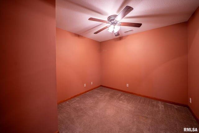 4627 S Queen Aleta Ct, Mapleton, IL 61547 - spare room featuring a ceiling fan, carpet floors, baseboards, and a textured ceiling
