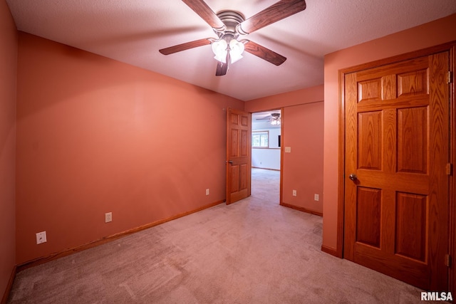 4627 S Queen Aleta Ct, Mapleton, IL 61547 - empty room with ceiling fan, light carpet, and baseboards