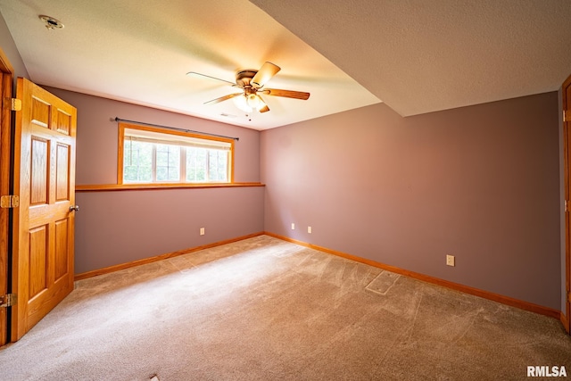 4627 S Queen Aleta Ct, Mapleton, IL 61547 - carpeted empty room featuring ceiling fan, a textured ceiling, and baseboards