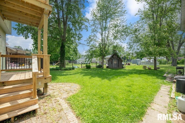 307 N Logan St, Deer Creek, IL 61733 - view of yard featuring a deck