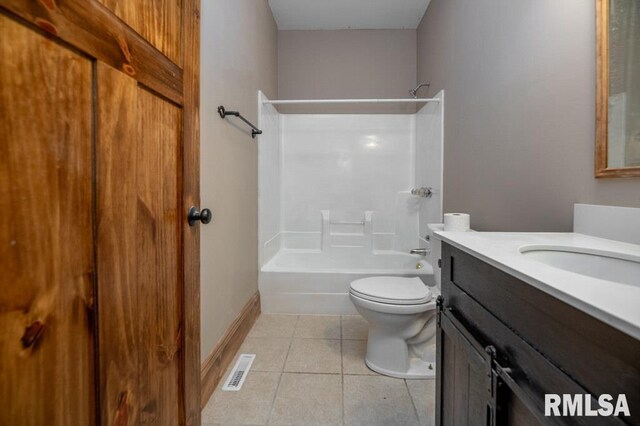 307 N Logan St, Deer Creek, IL 61733 - bathroom with vanity, shower / bath combination, tile patterned floors, toilet, and baseboards