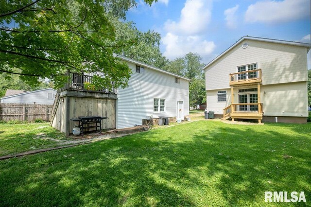 307 N Logan St, Deer Creek, IL 61733 - rear view of property featuring a balcony