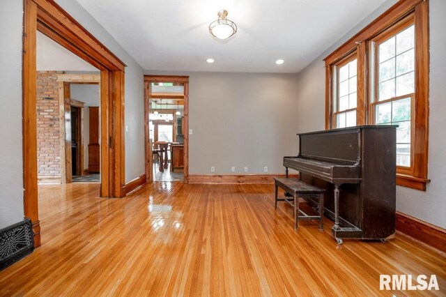 307 N Logan St, Deer Creek, IL 61733 - unfurnished room featuring wood finished floors, baseboards, and recessed lighting