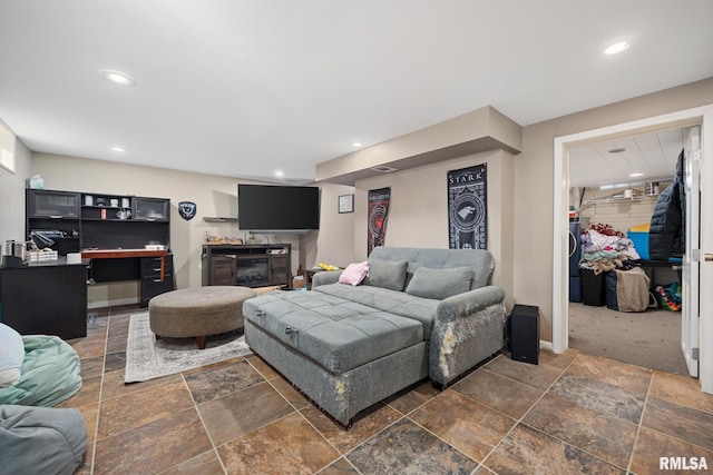 51 Lynnwood Ct, Morton, IL 61550 - living room featuring stone tile flooring, recessed lighting, and washer / dryer