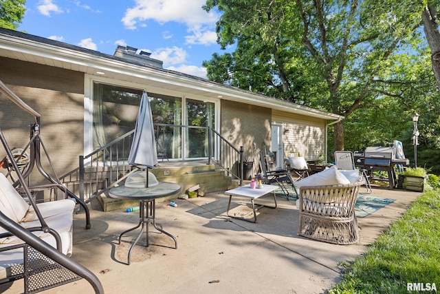 51 Lynnwood Ct, Morton, IL 61550 - view of patio with entry steps and an outdoor living space