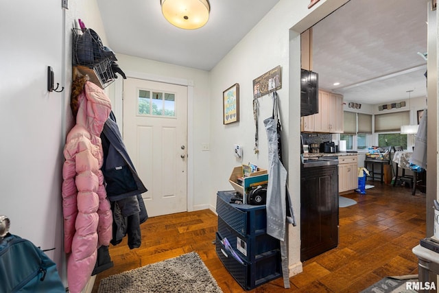 51 Lynnwood Ct, Morton, IL 61550 - foyer with healthy amount of natural light and dark wood-style floors