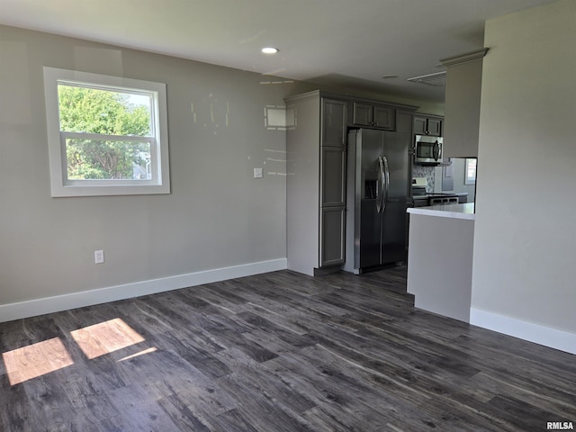 433 N Prairie Ave, Macomb, IL 61455 - kitchen with stainless steel appliances, dark wood-style flooring, recessed lighting, and light countertops