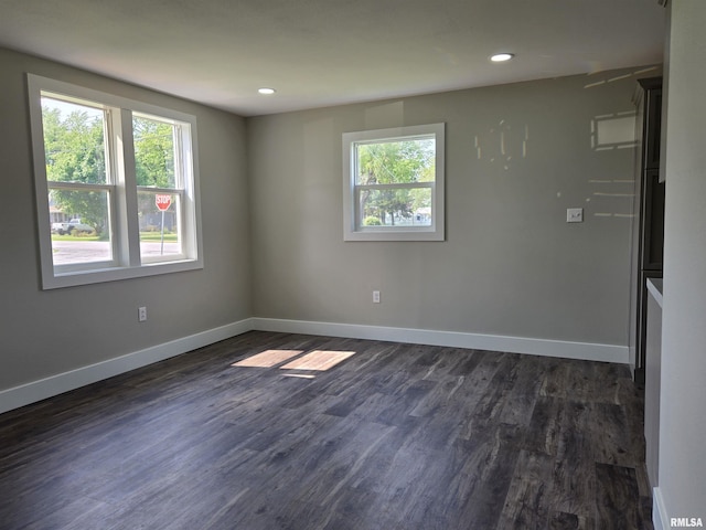 433 N Prairie Ave, Macomb, IL 61455 - spare room with plenty of natural light, dark wood-style flooring, and recessed lighting