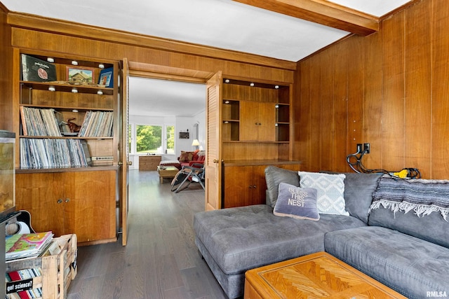 136 E Oak Park Dr, Peoria, IL 61614 - living room featuring wood walls, beam ceiling, and wood finished floors